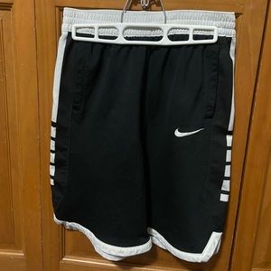 Youth XL black and white Nike basketball shorts.